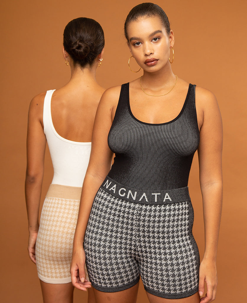 Female models wearing Nagnata Avika Tank tops in black & cream with the Checked Out Knit Shorts