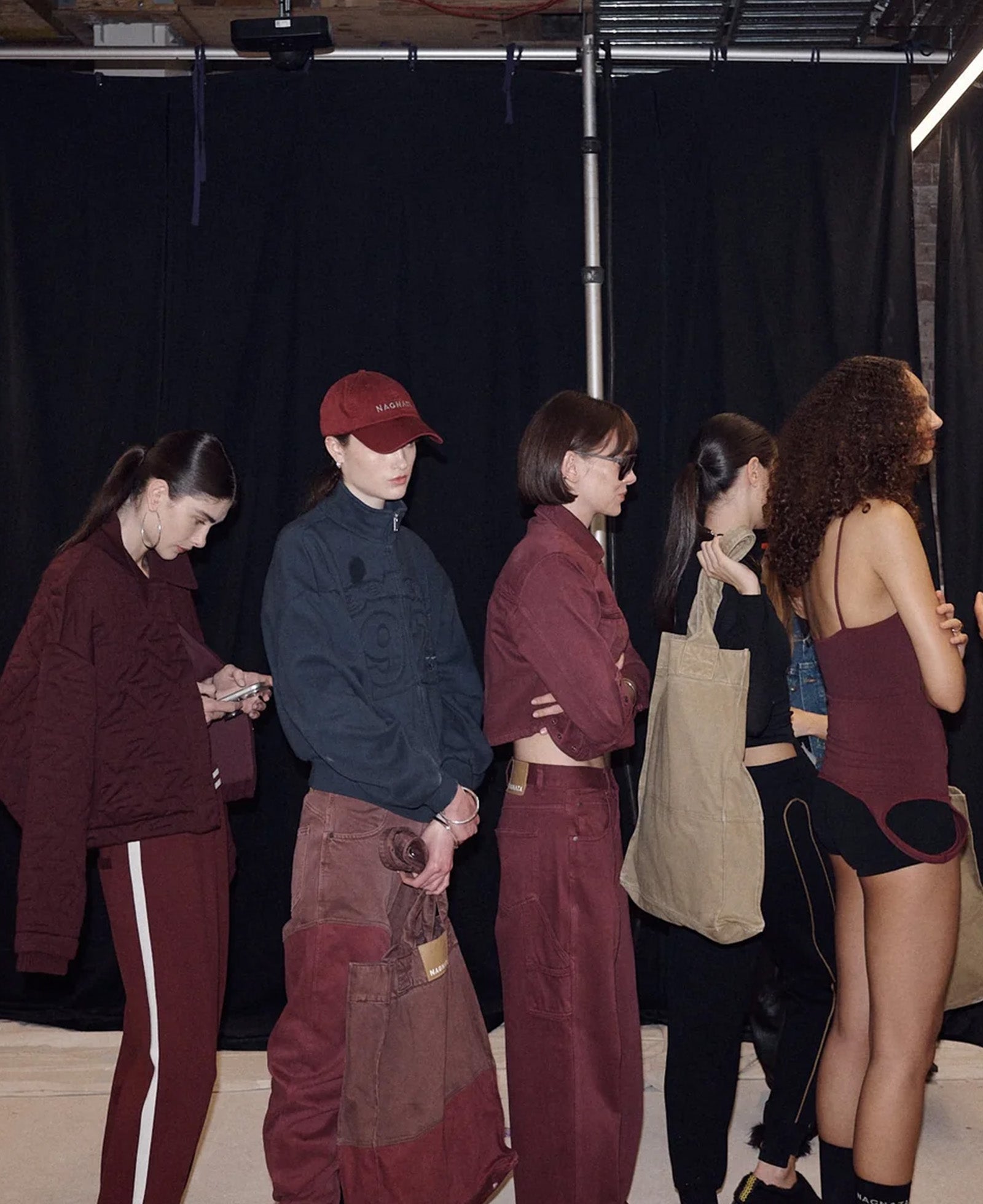 BACKSTAGE AT NAGNATA'S 'FUTURE = FIBRE' RUNWAY AT AUSTRALIAN FASHION WEEK 2026.