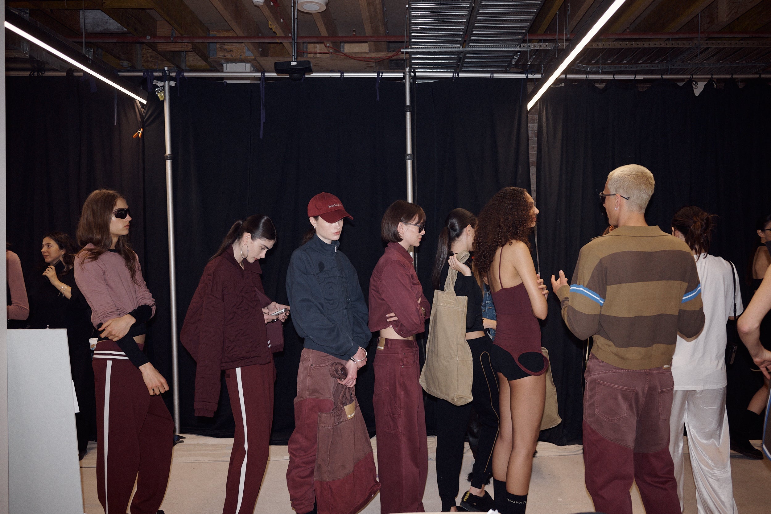 BACKSTAGE AT NAGNATA'S 'FUTURE = FIBRE' RUNWAY AT AUSTRALIAN FASHION WEEK 2026.