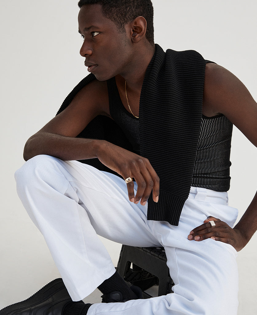 Female models wearing Nagnata Avika Tank tops in black & cream with the Checked Out Knit Shorts